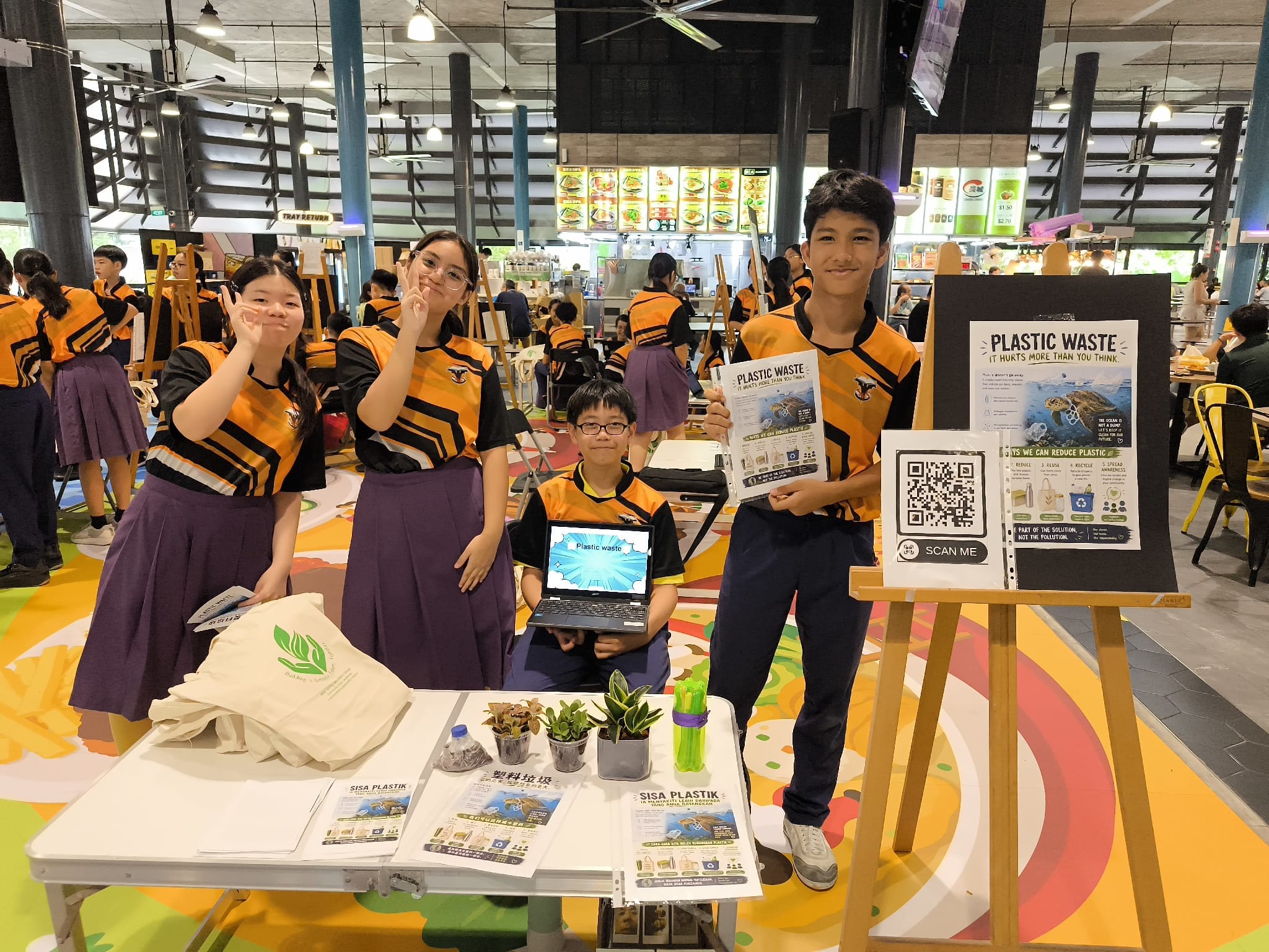 Group of students posing for environmental advocacy focusing on sustainability